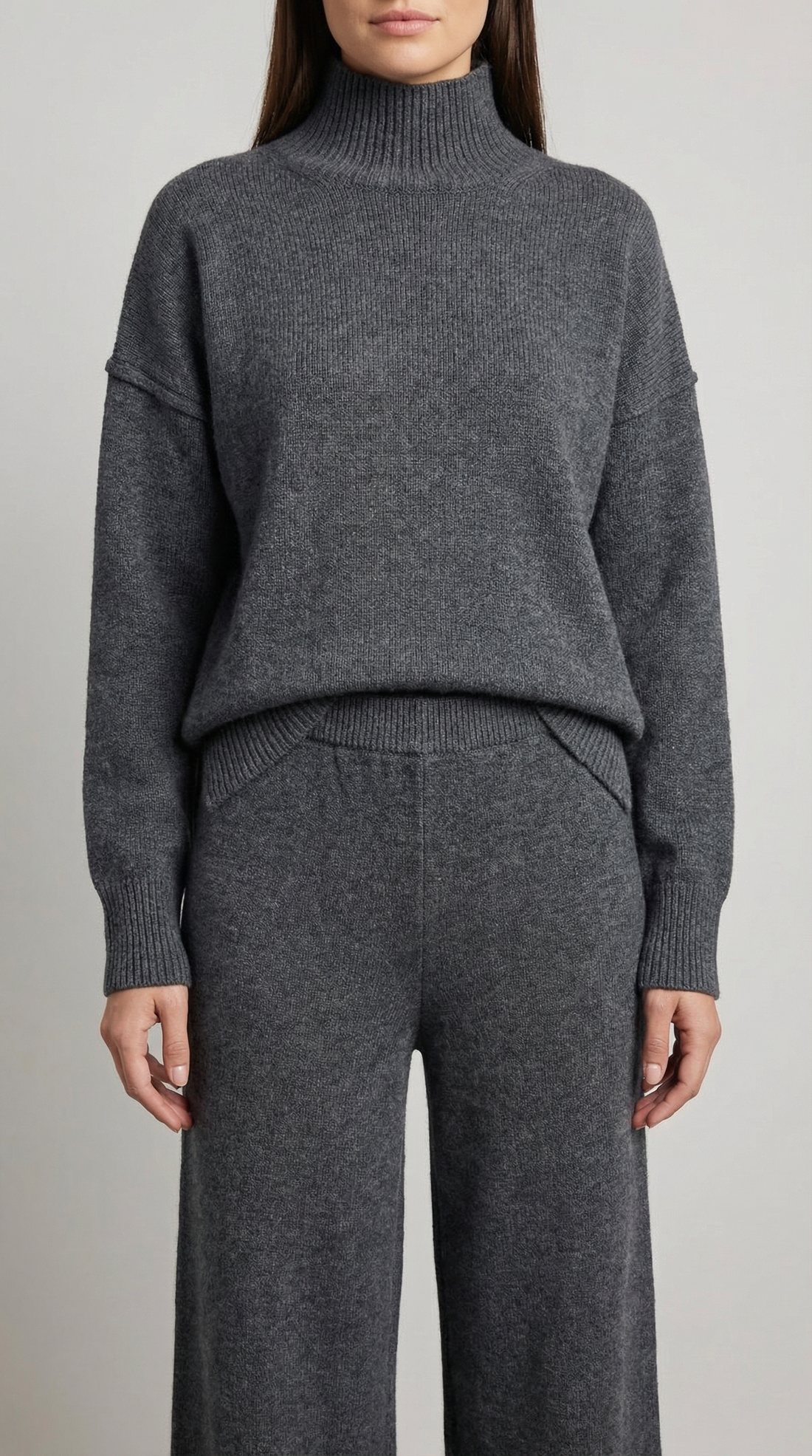 Conjunto de suéter de punto de cuello alto y jeans