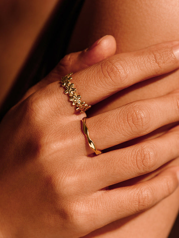 Elegante anillo de flor silvestre